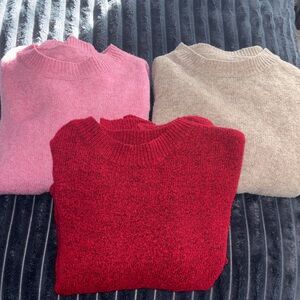 Lot of 3 sweaters. All measure oversized large.